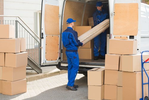 Business relocation team loading office items for transport in Kingston upon Thames