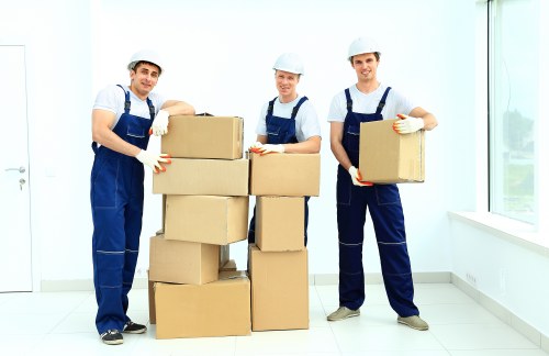 Packed boxes and household items arranged inside a removal van