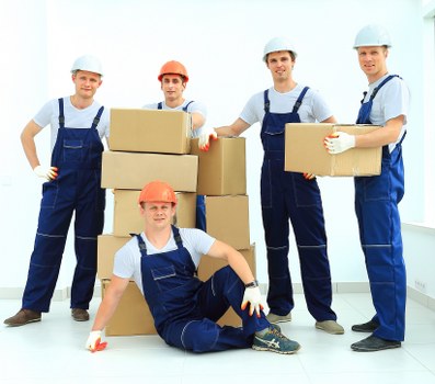 A local office relocation team handling furniture and files