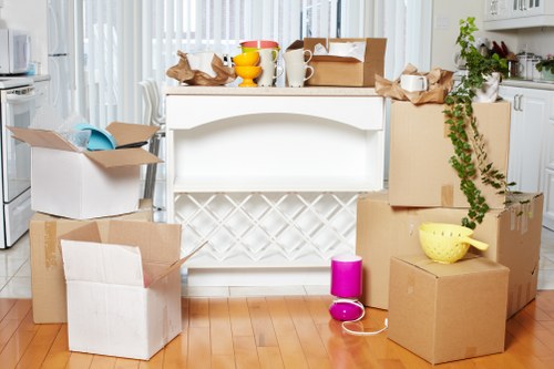 Unloading boxes and furniture into a new Kingston home