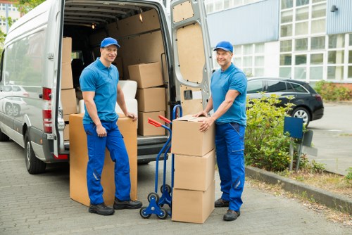 Packed office furniture and equipment ready for a business move in Kingston upon Thames