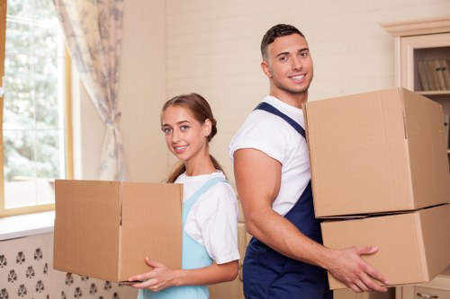 Packed household items ready for loading during a local removal
