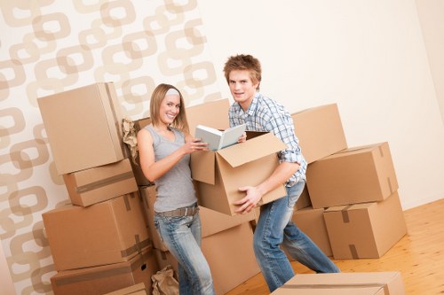 Moving truck loading furniture for a local business move